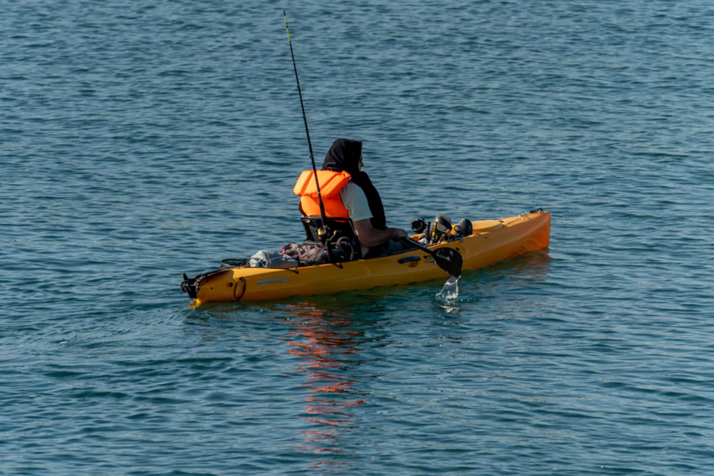 kayak fisherman holding fish kayak fisherman holding fish